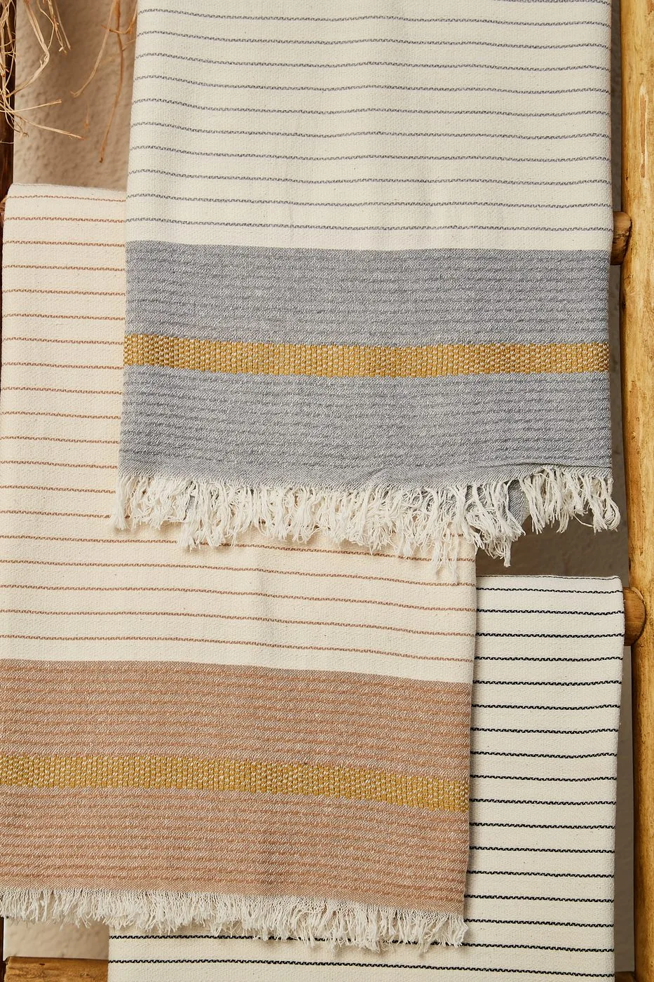 Quick-dry Turkish beach peshtemals with woven stripes and fringe