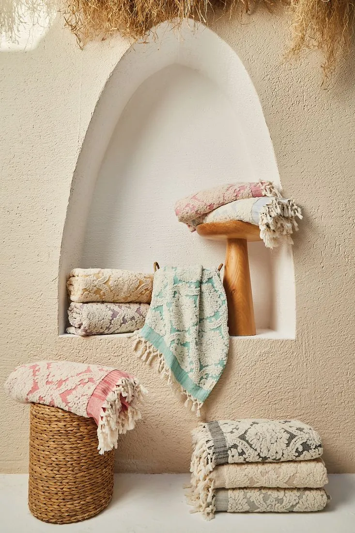 Folded Turkish towels stacked at the family stall in the Grand Bazaar